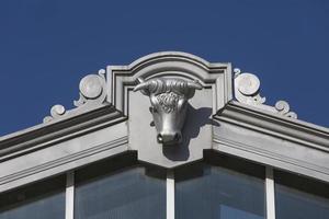 Head of bulls, like ornaments of the old calf ship of the Matadero de Madrid, Spain photo
