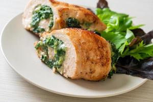 Chicken breast stuffed with cheese and spinach photo