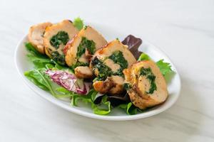 Chicken breast stuffed with cheese and spinach photo