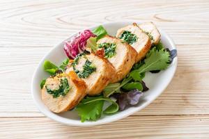 Chicken breast stuffed with cheese and spinach photo