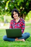 Asian women smile happily and laptop. Work online online communication Messaging Online learning Online communication concept