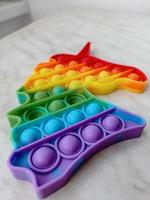 Rainbow toy for children in the shape of a unicorn