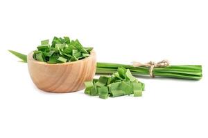 Pandan leaf and slice in wooden bowl isolated on white background with clipping path. photo