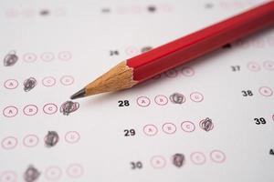 Answer sheets with pencil drawing fill to select choice, education concept photo