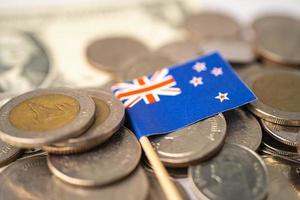 Stack of coins with Australia flag on white background. photo