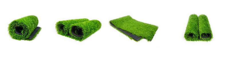 set roll  of artificial green grass isolated on white background,plastic lawn photo