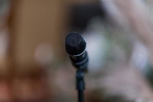 Microphone on stage, speaker, conference photo