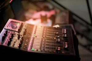 Sound check for concert, mixer control, music engineer, backstage photo