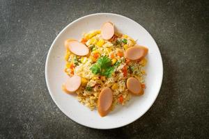 Fried rice with sausage and mixed vegetable photo