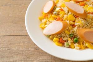 Fried rice with sausage and mixed vegetable photo