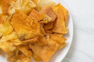 Deep-fried pork wonton with dipping sauce photo