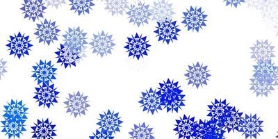 Fondo de vector azul claro con copos de nieve de Navidad.