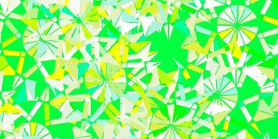 Light green, yellow vector pattern with colored snowflakes.