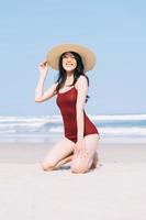 Beautiful young Asian woman in swimwear photo