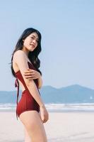 Beautiful young Asian woman in swimwear photo