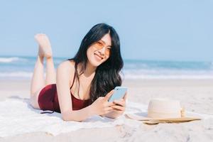 Beautiful young Asian woman in swimwear photo