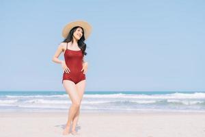 Beautiful young Asian woman in swimwear photo