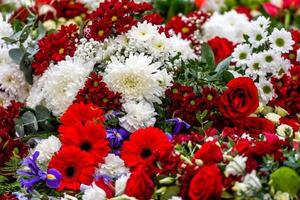 Irregularly placed flowers in various colors, Multi colored floral background - Image
