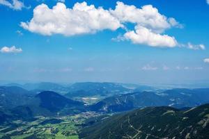 The Austrian Alpine mountain landscape on a hazy autumn day. photo