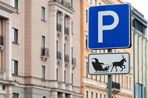 A parking sign for Santa reindeer and sleigh, new year - christmas concept - image photo