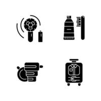 Things for travelling tourist suitcase black glyph icons set on white space. Compact fan. Toothbrush and paste. Mini size objects for tourist. Silhouette symbols. Vector isolated illustration