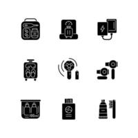 Airplane passenger travelling things black glyph icons set on white space. First aid kit. Weighing baggage. Mini size objects for tourist comfort. Silhouette symbols. Vector isolated illustration