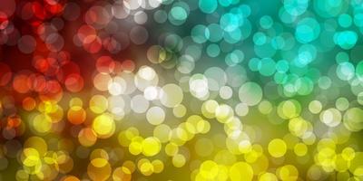 Light Multicolor vector backdrop with circles.