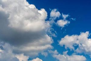 Clouds over blue sky photo