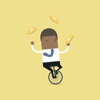Hombre de negocios africano haciendo malabares con monedas mientras monta en bicicleta vector