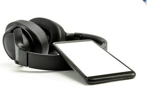 Headphones with Bluetooth technology on white background photo