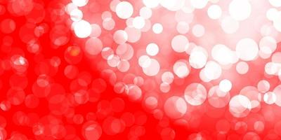 Light Red vector background with spots.