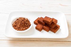 Fresh and soft chocolate with cocoa powder photo