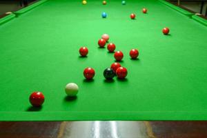 Snooker balls on green snooker table photo