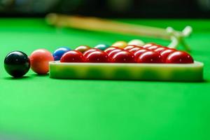 Snooker balls on green snooker table photo