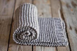 Hand knitted beige scarf photo