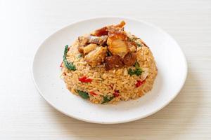 Fried rice with Thai basil and crispy belly pork - Thai food style photo