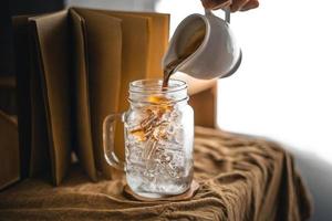 Iced coffee iced latte on table in home photo