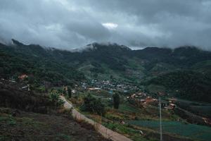 Village in the mountains in the tropical rainforest photo