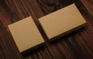 Cardboard box mockup on wooden background photo