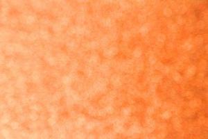 Abstract orange bokeh background photo