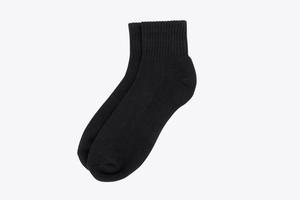 Black crew socks isolated on white background photo