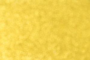 Abstract golden bokeh background photo