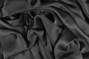 Smooth elegant silk or satin texture can use as abstract background. Luxurious background design photo