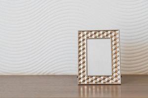 Empty picture frame decoration on white wall with copy space photo