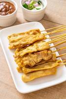 Pork satay - Grilled pork served with peanut sauce or sweet and sour sauce photo