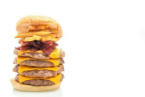 Pork hamburger or pork burger with cheese, bacon, and french fries isolated on white background photo
