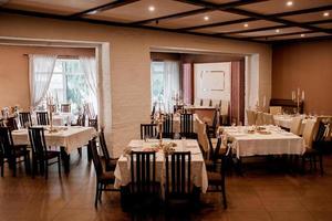 the presidium of the newlyweds in the banquet hall of the restaurant photo