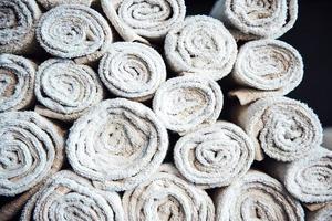 white clean barberman towels rolled into a cylinder photo