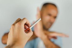 Man refusing a cigarettes. Concept Quitting smoking,World No Tobacco Day. photo