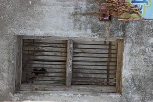 door with window with wood background photo